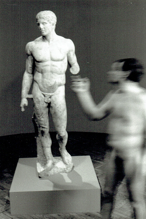 Pursuing Perfection — The Doryphoros. Giles Denmark Performance Art at Minneapolis Institute of Art, 1992.