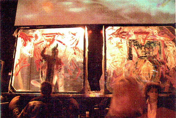 Giles Denmmark performance painting on main stage at First Ave Danceteria, Minneapolis with audience and music of Prince
