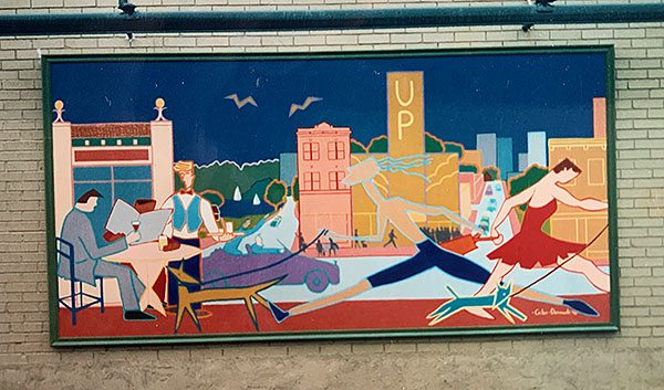 Exterior mural by Giles Denmark of Minneapolis Uptown on Lake Street and Hennepin, 1980s